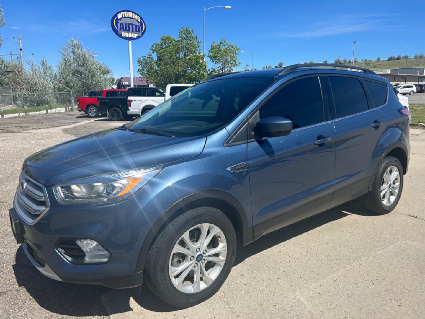 2018 BLUE Ford Escape SEL (1FMCU9HD6JU) with an L4, 1.5L engine, Automatic transmission, located at 3030 CY Ave, Casper, WY, 82604, (307) 265-3830, 42.827816, -106.357483 - Photo#1